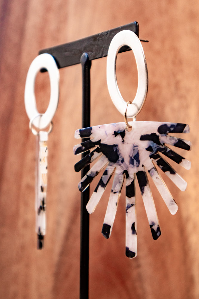 Earrings by FeSendra | silver-plated 999 zamak and titanium studs, and an acetate pendant
