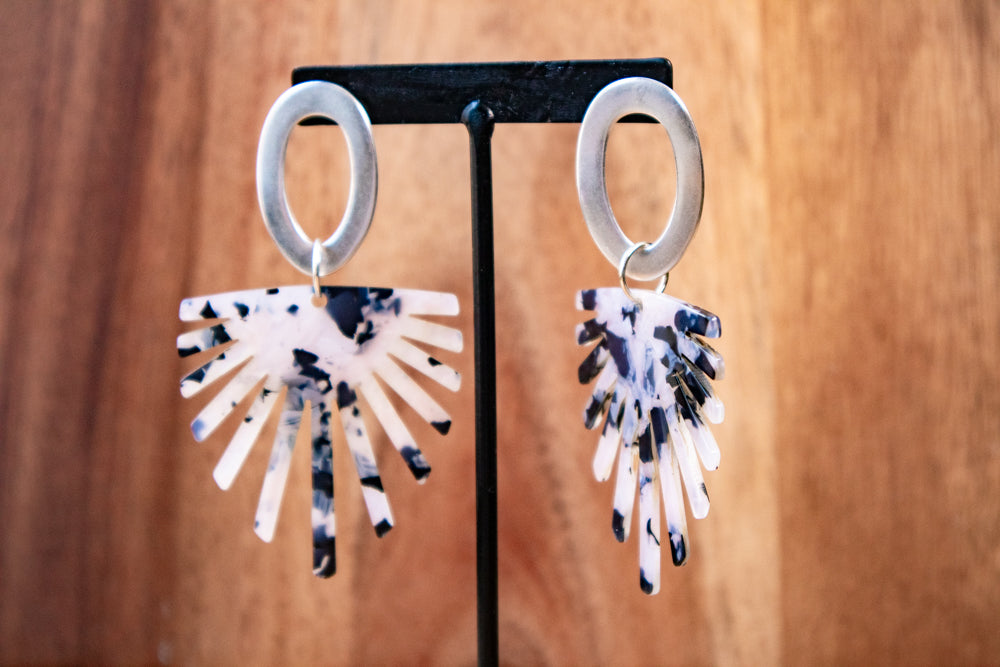 Earrings by FeSendra | silver-plated 999 zamak and titanium studs, and an acetate pendant