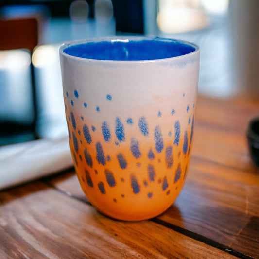 Handmade ceramic cup | orange, white and blue